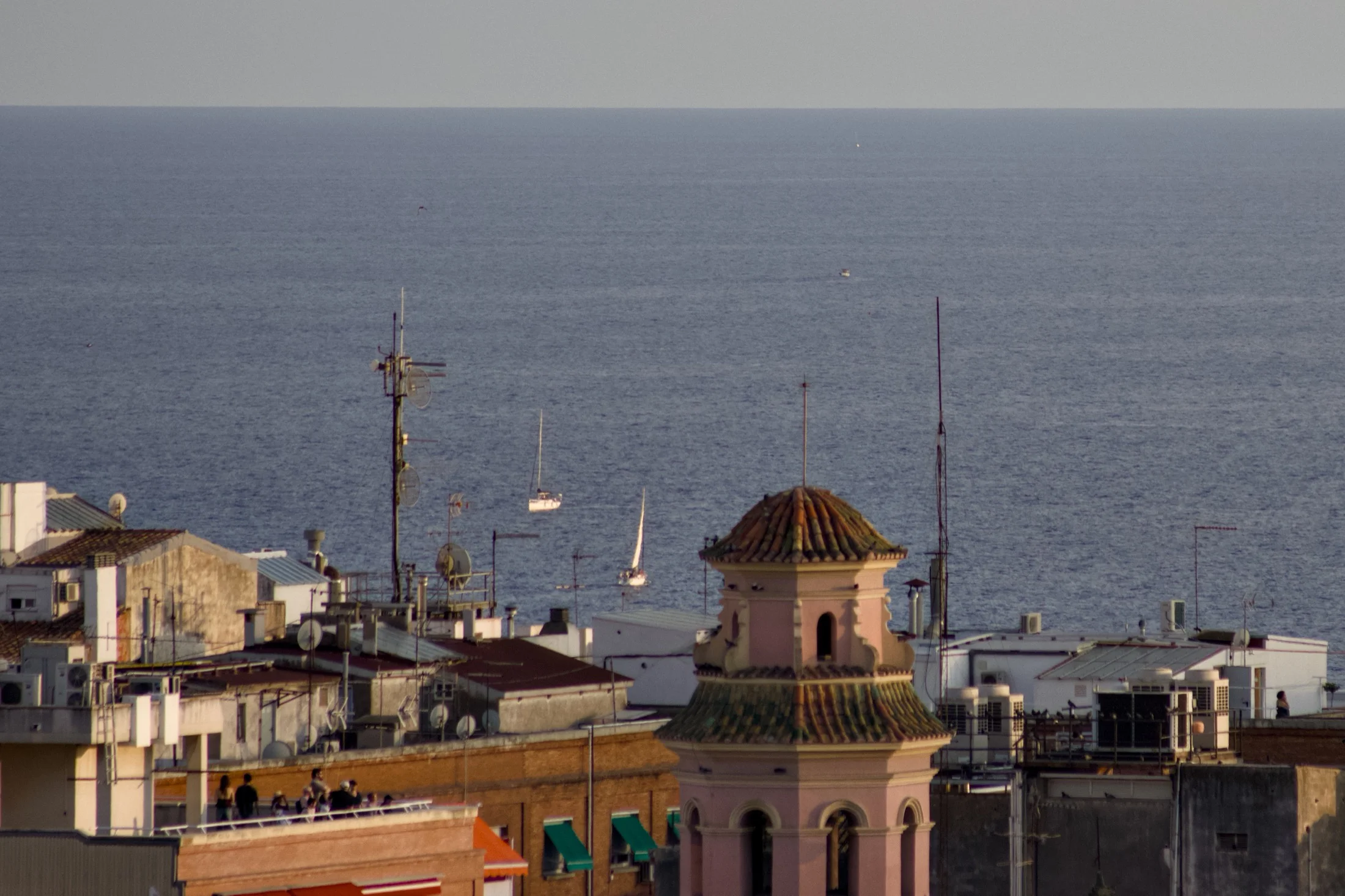 rooftops of Tarragona under the eclipse light