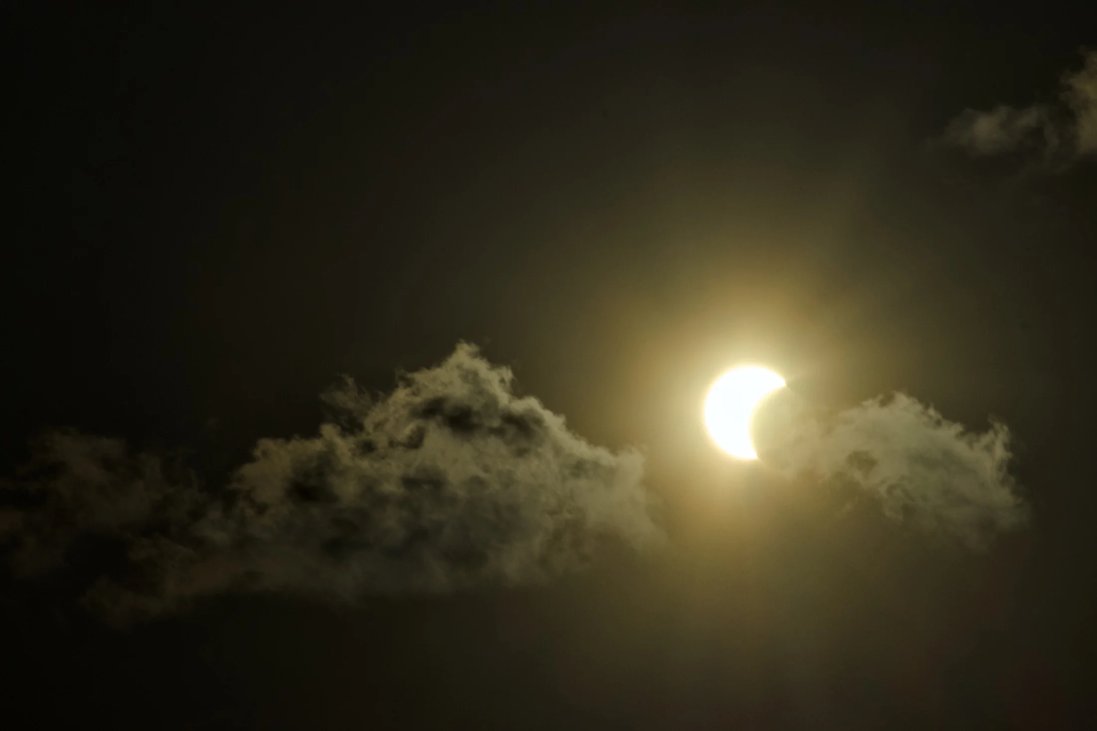 the partially eclipsed sun over Tarragona