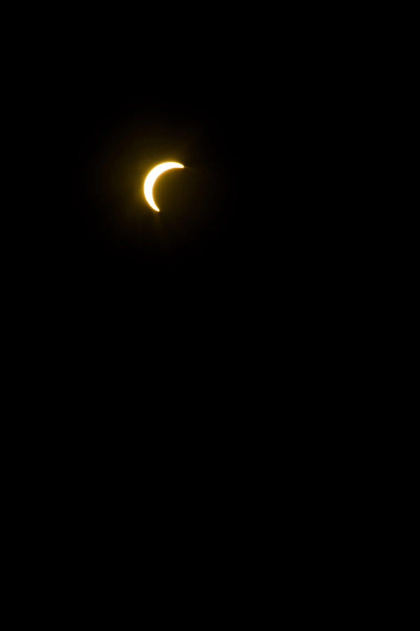 the sun mid-eclipse over Tarragona, 12/08/2026