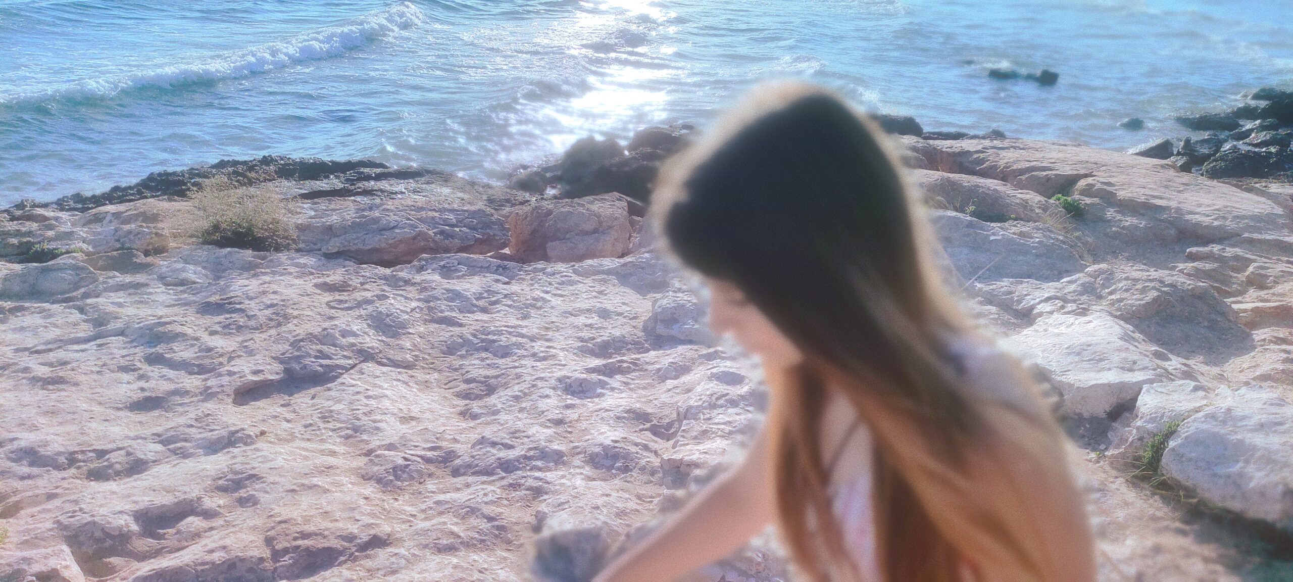 blurry girl at the beach